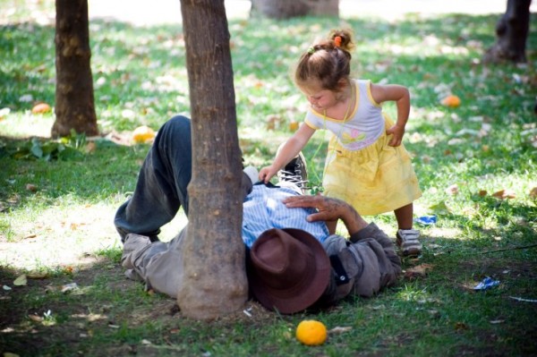 A Young Girl Pokes a Man A Girl Pokes a Man