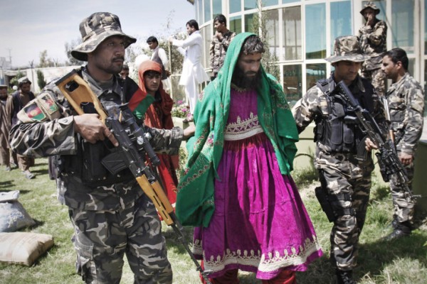 Militant Arrested in Women Dresses Militant Arrested in Women Dresses