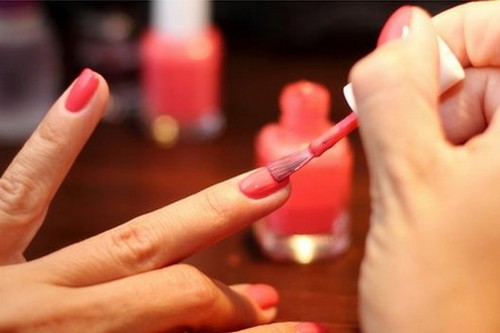 woman painting nails
