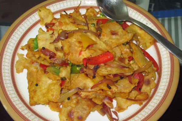 Roti upma dish prepared with leftover food Roti upma dish prepared with leftover food